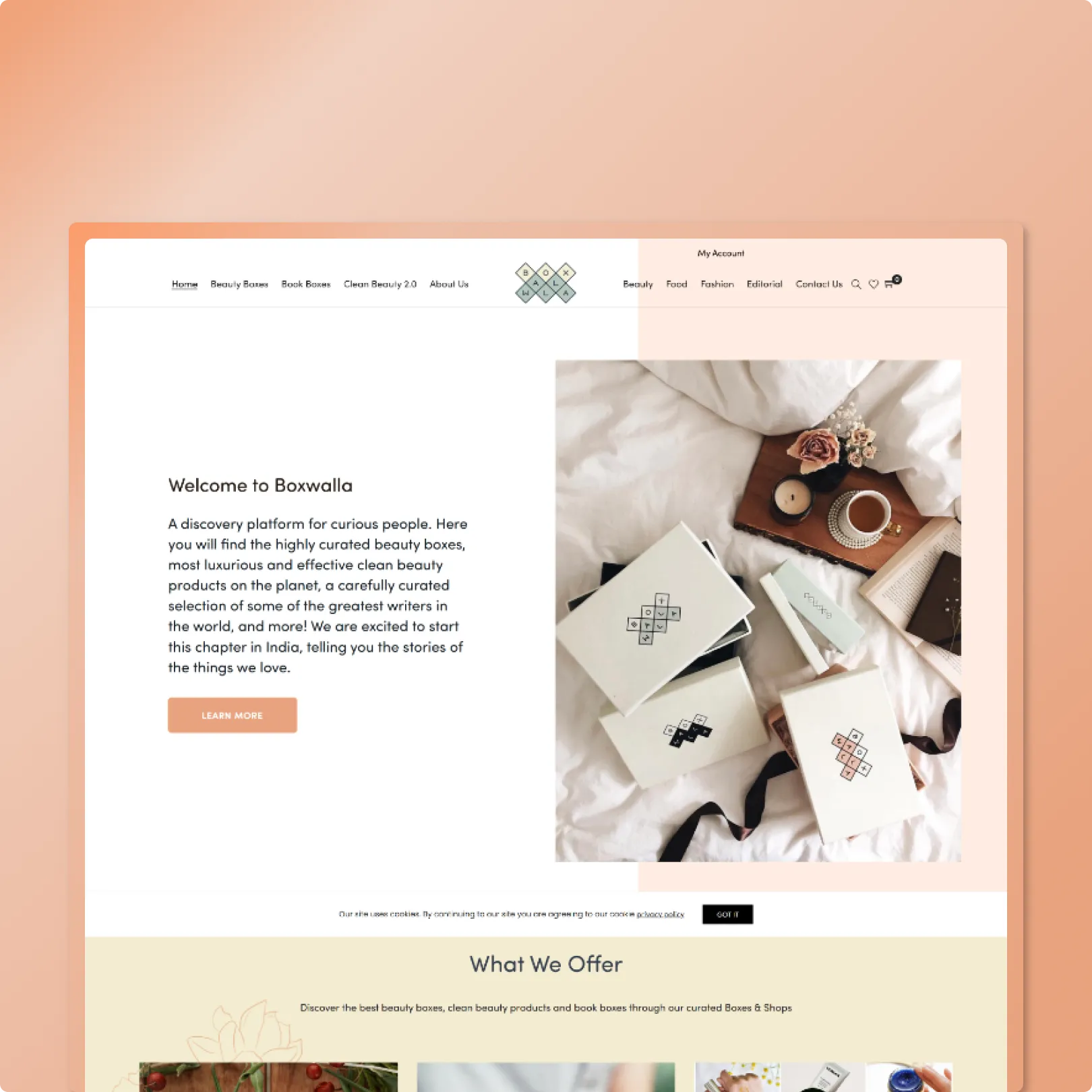 Clean subscription beauty ecommerce with split hero, product box photography, peach and cream palette, and Learn More CTA